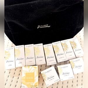 Clarins precious: cream, eye cream, two kinds of serums with a gift candle!